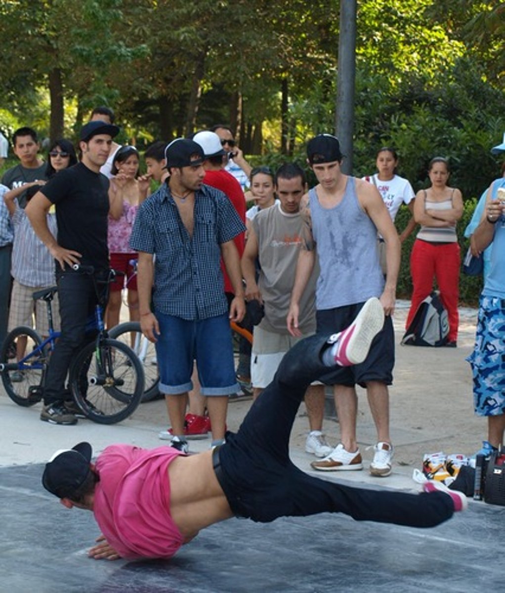 <p>- also known as b-boying, is a style of street dance and the first hip-hop dance style that originated among Black and Puerto Rican youths in New York during the early 1970s.</p>