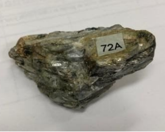 <p>Indicates high grade metamorphism (equal or greater than Staurolite) ● Habit: Blade-like ● Lustre: Vitreous/ Pearly ● Colour: Commonly blue (sometimes white, grey, green, black) ● Streak: Grey ● Hardness: Parallel = 4.4.5 Perpendicular = 6.5</p>