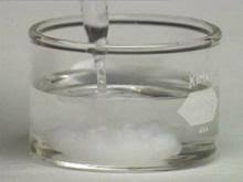 <p>Ba(NO<sub>3</sub>)<sub>2(aq)</sub> + Na<sub>2</sub>SO<sub>4(aq)</sub> → BaSO<sub>4(s)</sub> + NaNO<sub>3(aq)</sub></p><p>net ionic equation: Ba<sup>2+</sup><sub>(aq)</sub> + SO<sub>4</sub><sup>2-</sup><sub>(aq)</sub> ⇌ BaSO<sub>4(s)</sub></p><p>barium sulfate is insoluble in water and will precipitate out of the solution, which is a clear sign that a chemical reaction has occurred</p>