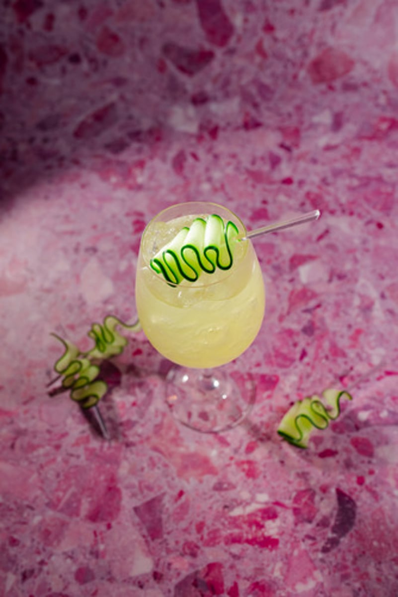 <p>Sol Spritz - NEW!</p><p>- Las Californias Cítrico gin</p><p>- Ancho Reyes Verde</p><p>- House-made cucumber syrup</p><p>- Fresh lime juice</p><p>- Topo Chico</p><p>Garnish: Skewered cucumber ribbon</p><p>Flavor profile: Light and refreshing</p><p>Selling description: A light and refreshing cucumber spritz crafted with a citrus-forward Baja California gin.</p><p>** Not available at airport locations.</p>