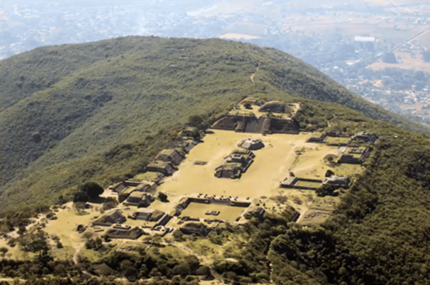 <p>-capital city of Zapotec, urbanized city</p><p>-early: city states</p><p>-built on a hill for a defensable location, and connection to gods</p><p>-same general plan as other Mesoamerican citites</p><p>-unique: citadel, defensive</p>