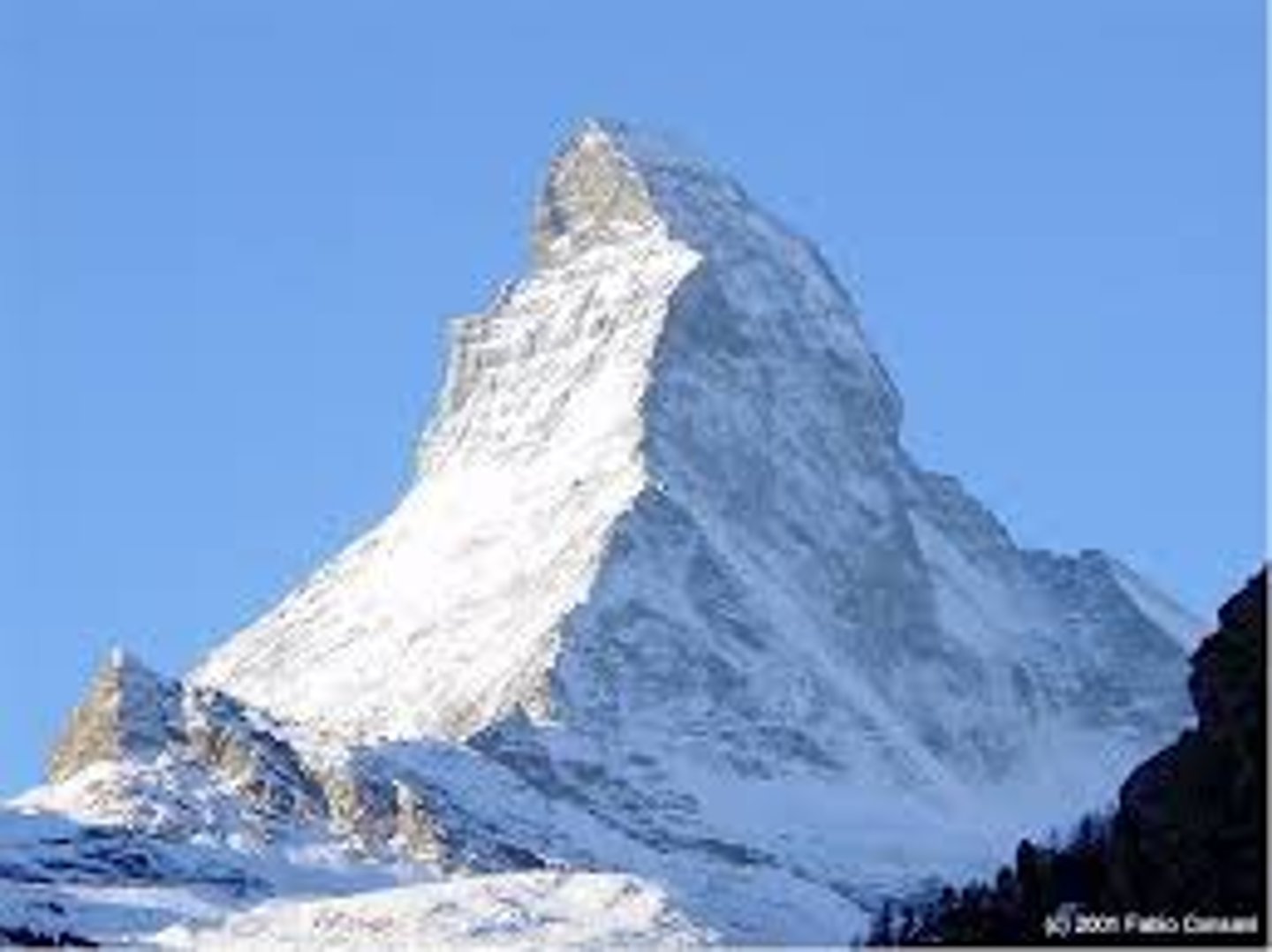 <p>A pyramid-like peak formed by glacial action in three or more cirques surrounding a mountain summit.</p>
