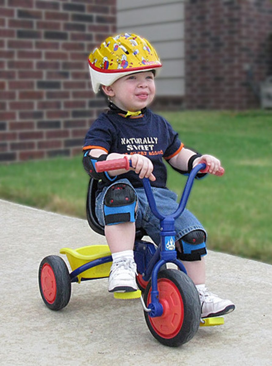 <p>ride a tricycle</p>