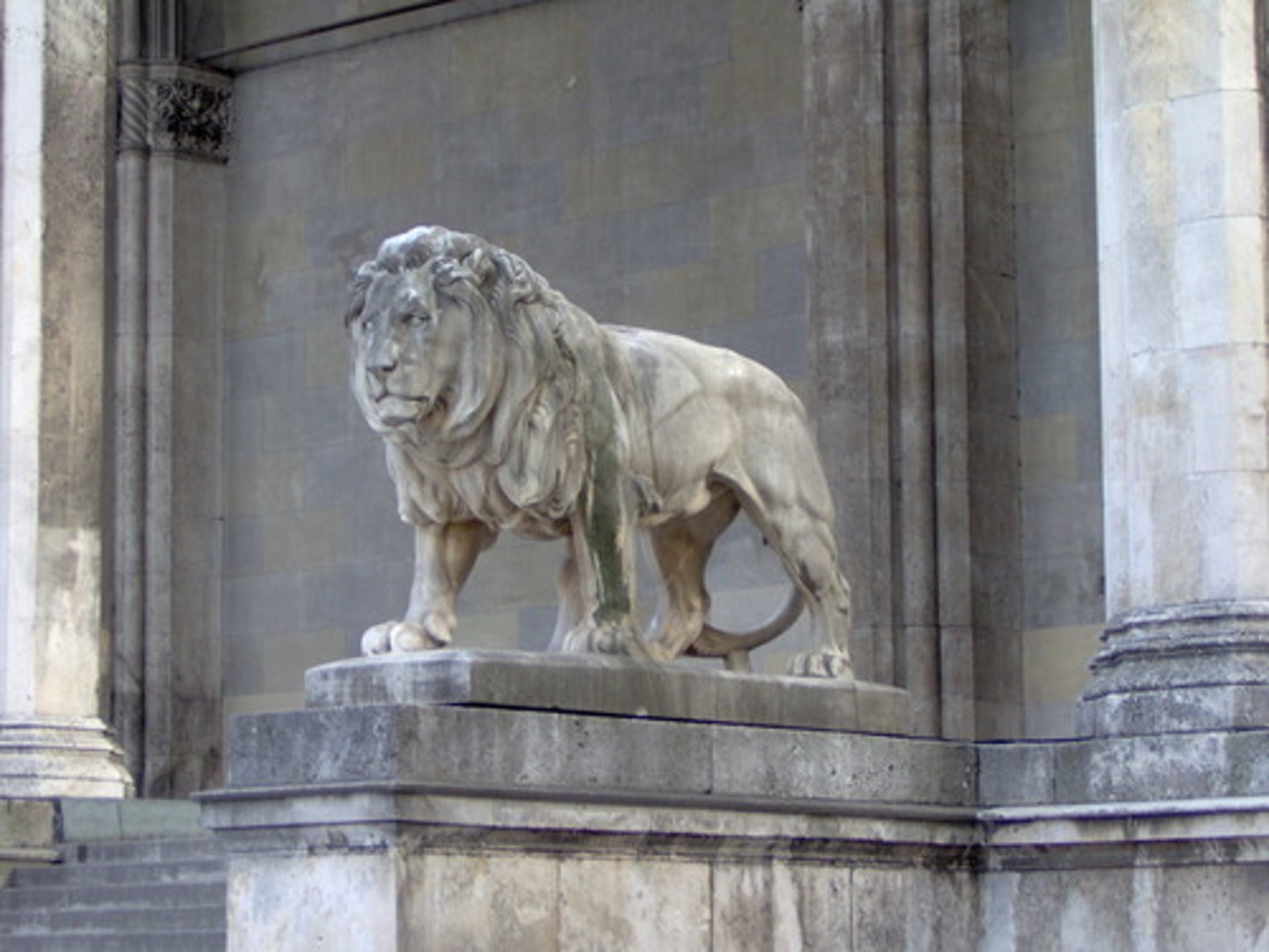 <p>resembling a statue and having a tall and shapely form</p>