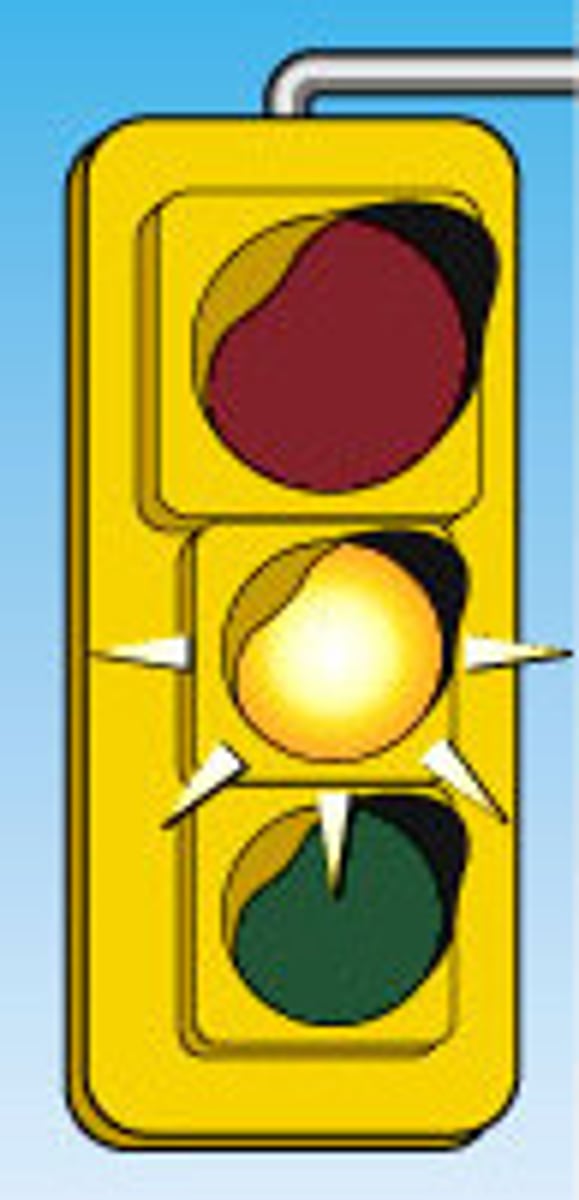 <p>don't stop, slow down and proceed with caution</p>