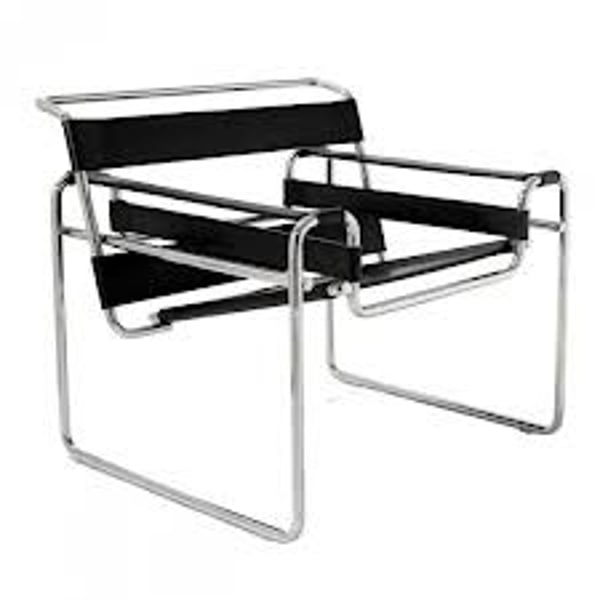 <p>Nickel plated steel frame with leather arms, seat and back rest by Marcel Breuer</p>