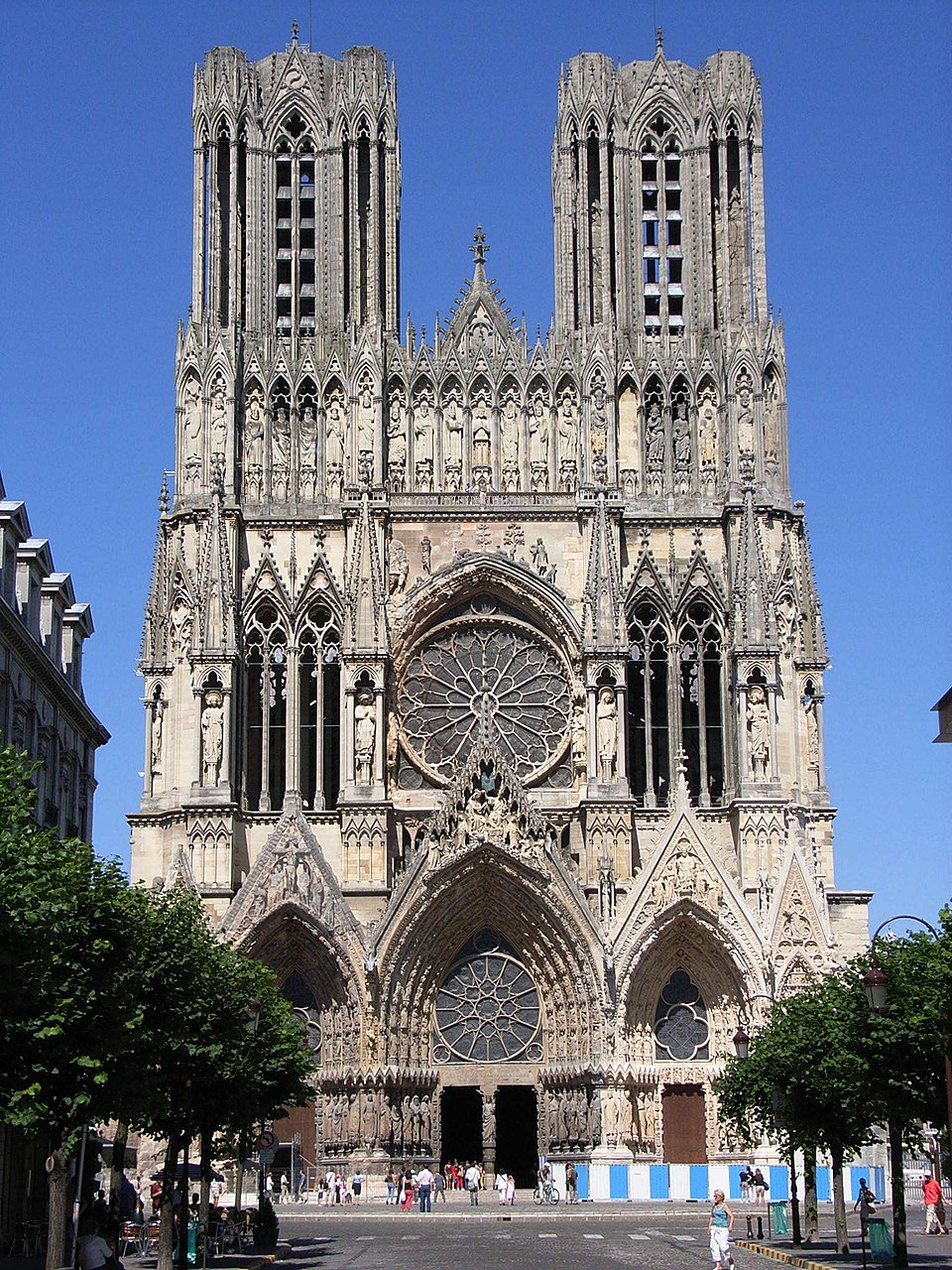 <ul><li><p>Cathedral where French Kings were crowned </p></li><li><p>It was rebuilt with 550 statues known as “the smiling angels” </p></li></ul><p></p>