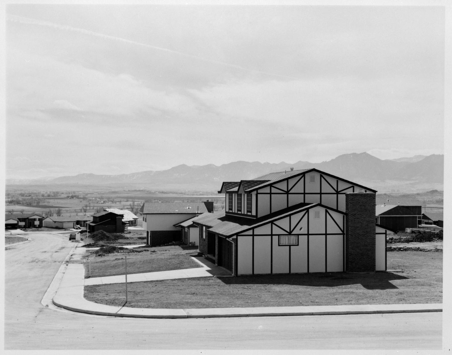 <p>Robert Adams — <em>Tract House, Boulder County, Colorado</em> (1973)</p>