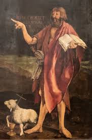 <p>Afgebeeld als gebaarde figuur in mantel van ruwe stof. Vaak met lam, kruisstaf en/of banderolle met tekst in hand. </p>