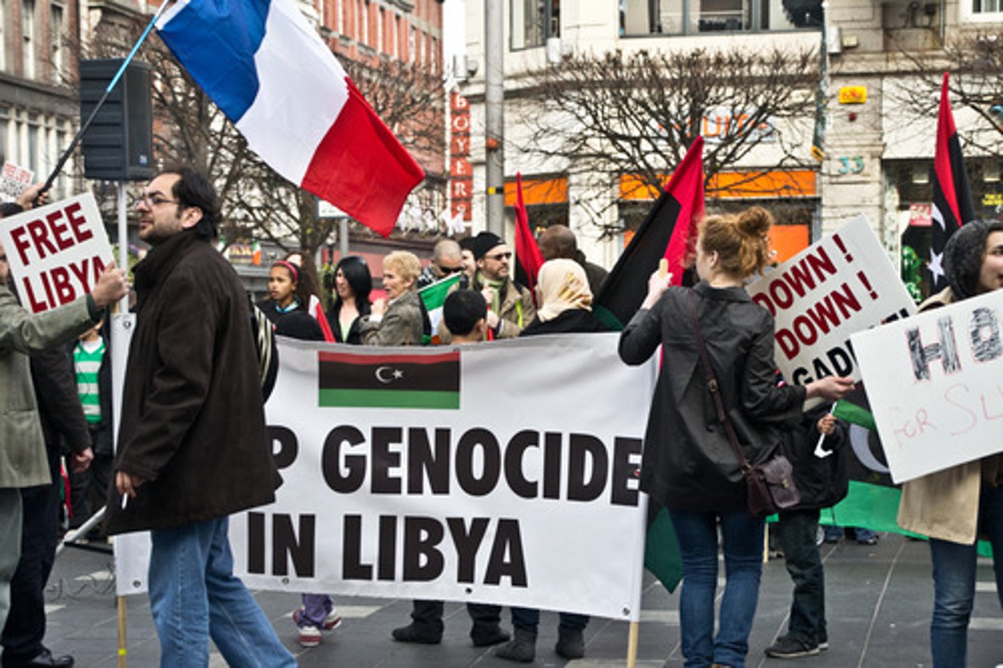 <p>a person who opposes official policy, especially that of an authoritarian state.</p>