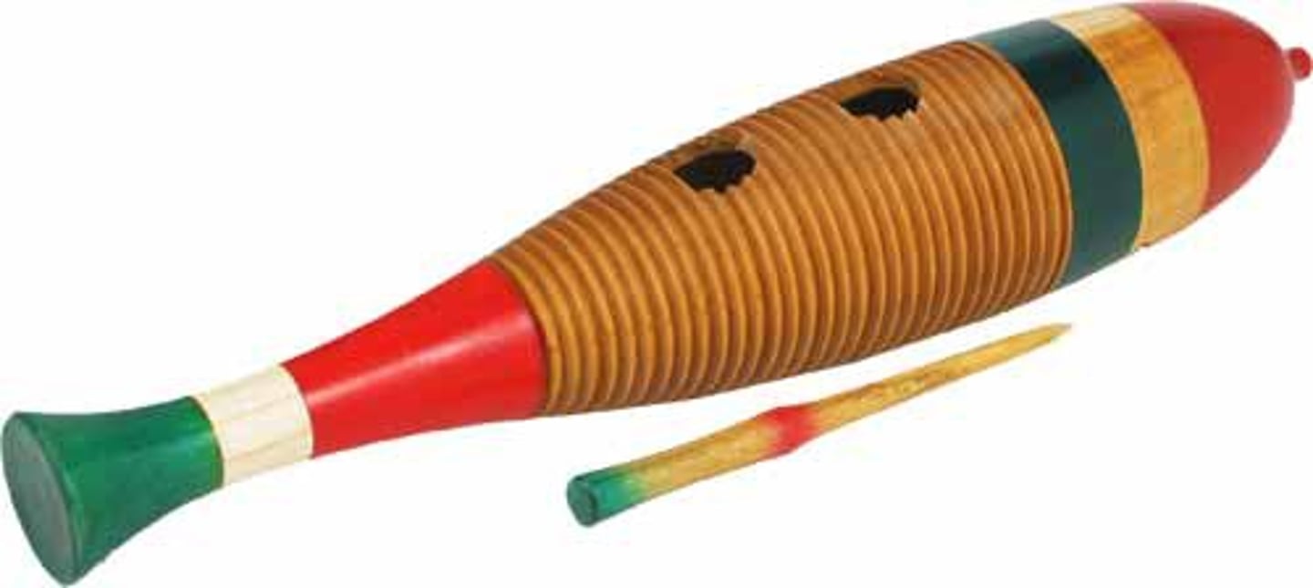 <p>percussion instrument used in Caribbean music, guiro</p>