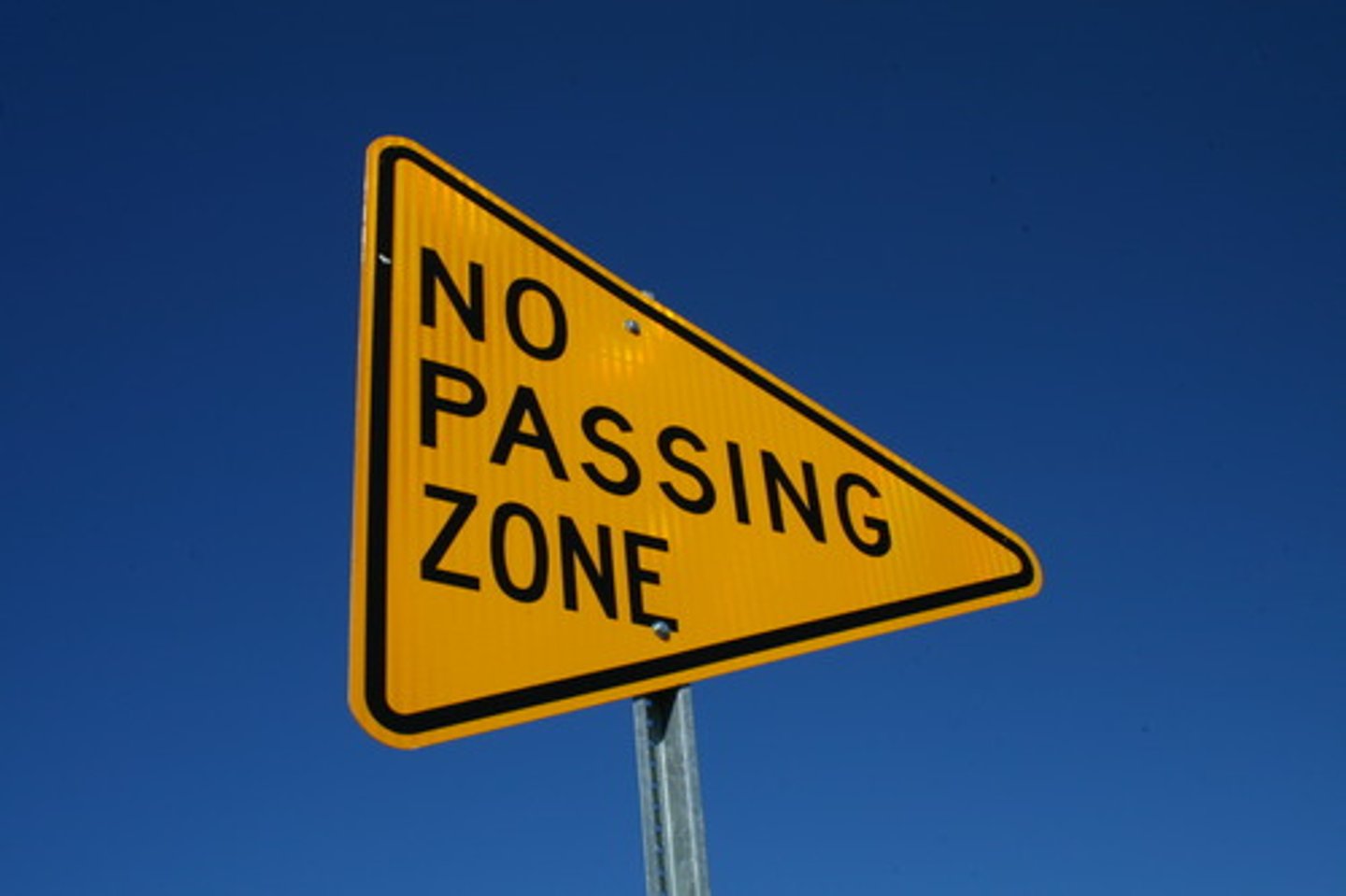 <p>A pennant that indicates the beginning of a no passing zone.</p>