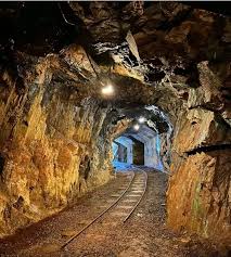 <p><span>extracting materials from beneath the Earth's surface</span></p>