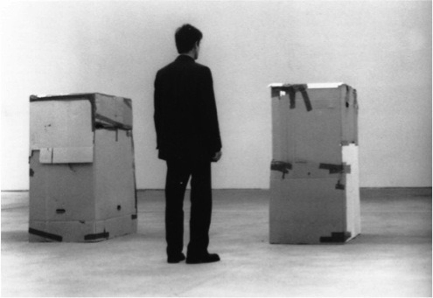 <p>Theme: The Body - Sierra is concerned with perpetual unemployment of the worker who is also a refugee, and the art receives its disturbing resonance as the viewer considers the bodily discomfort caused by cramming inside a cardboard box for hours. </p>