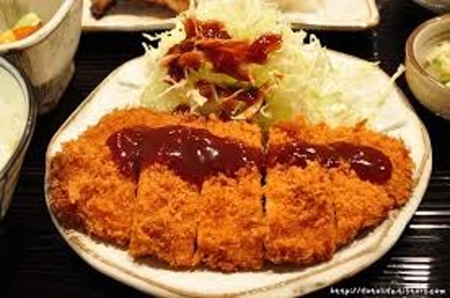 <p>tonkaush (carne de cerdo rebozada)</p>