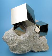 <p>Brassy yellow like gold. it’s fools gold. no cleavage, but sometimes comes out in cool cubes. has metallic luster, and is about a 6-6.5 on the hardness scale</p>