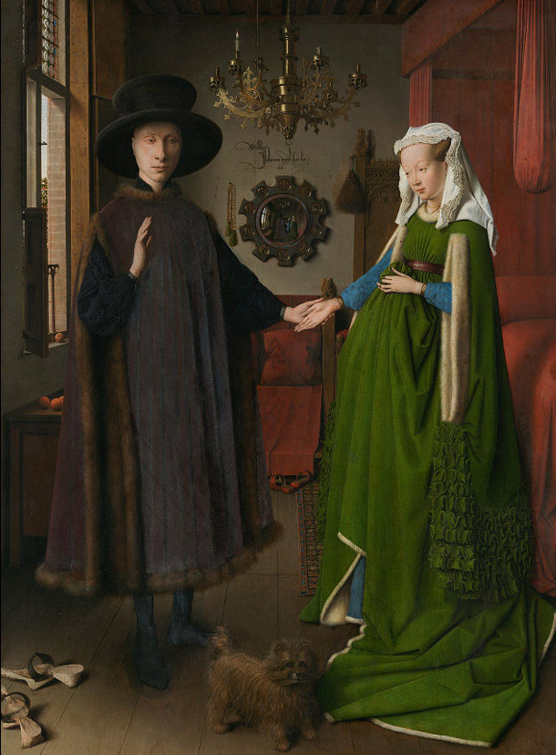 <p>This artwork is an oil painting of a couple getting married. This painting shows a lot of objects pointing to the fact that this couple is rich. The large amount of fabric that is on the woman and the fur that is on the man clothes shows this couple thriving in selling textiles. </p>
