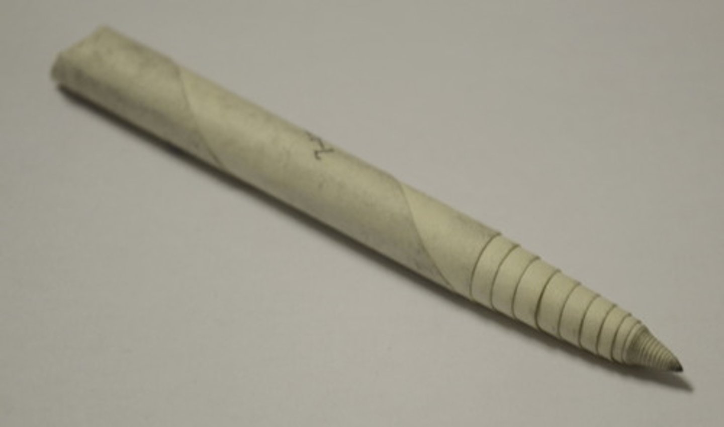 <p>A piece of paper wrapped tightly, ending in a point that can be "used to blend pencil and charcoal."</p>