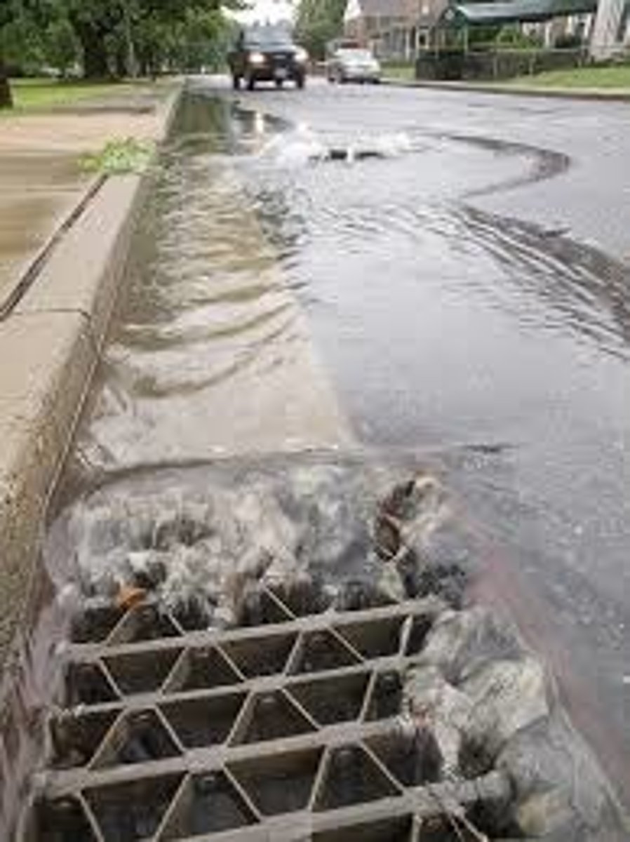 <p>Water that travels down, across the surface of the Earth in uncontrolled streams, rivers, drains or sewers</p>