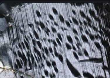 <p>is a texture in igneous rocks that features the intergrowth of plagioclase and alkali feldspar, often displaying a distinct pattern and indicative of particular crystallization conditions. </p>