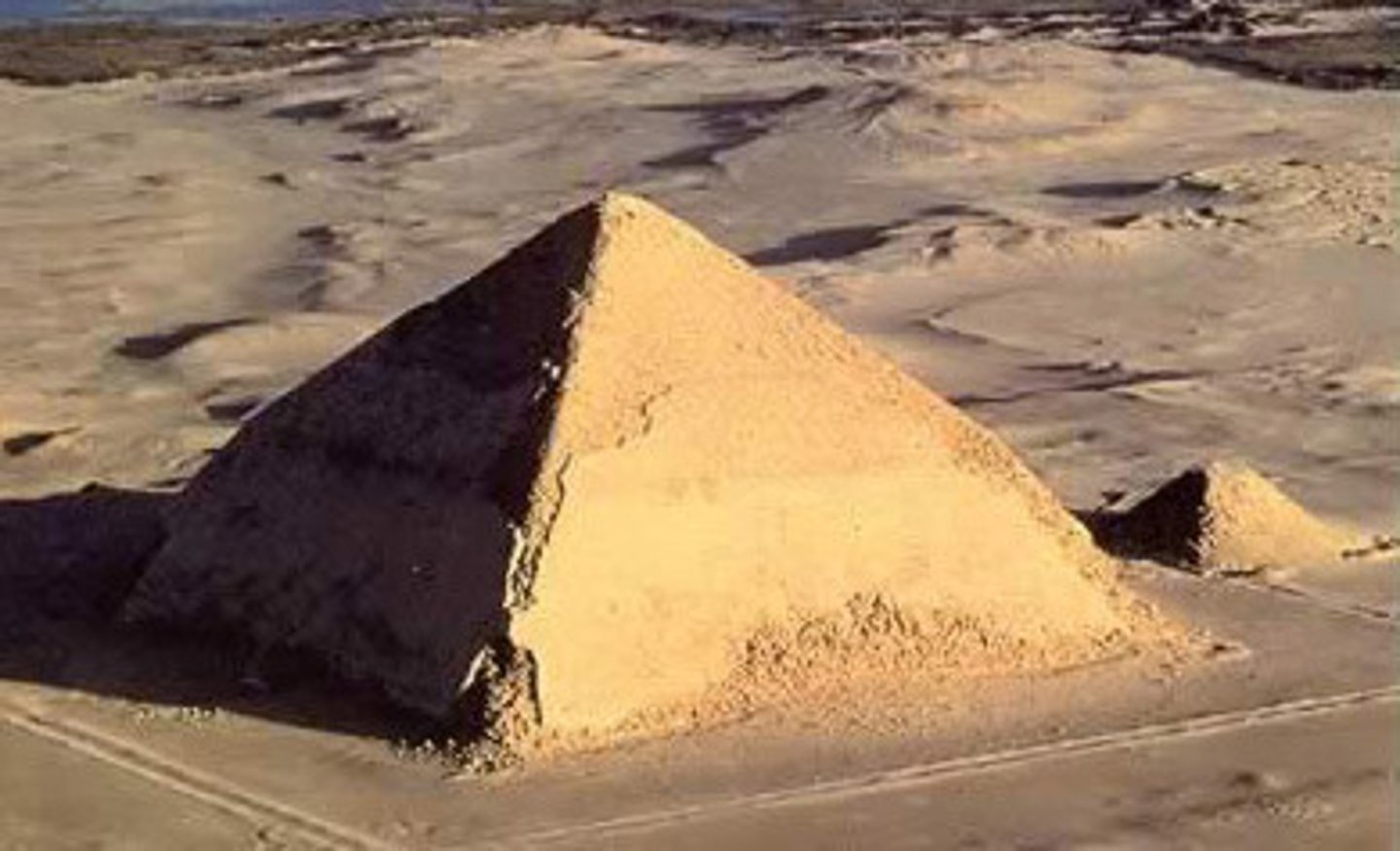 <p>- Pharaoh Sneferu (c. 2613-2589 BCE) built three major pyramids: Meidum, Bent, and Red</p><p>- Each reflects experimental refinements moving from step to true smooth-sided pyramid</p><p>- The Bent Pyramid has a distinctive angled shape due to a mid-construction slope change</p><p>- The Red Pyramid is considered the first fully successful true pyramid</p><p>- Sneferu's pyramids collectively pioneered pyramid architecture for his son Khufu</p>