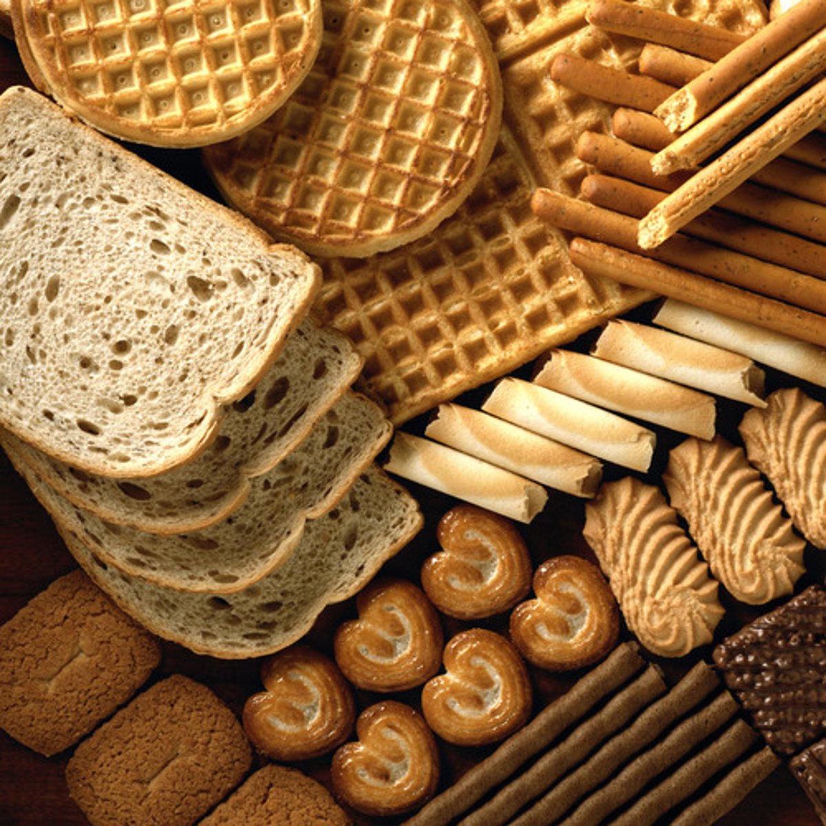 <p>foods like bread, rice, and pasta that give you energy (neutral)</p><p>Bread has a lot of ~.</p><p>Athletes eat more ~.</p>