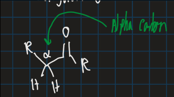 <p>The carbon directly attached to the carbonyl carbon C=O </p>