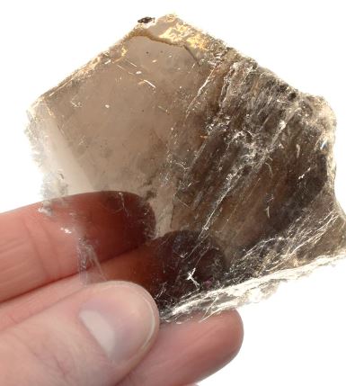 <p>Mineral, vitreous, glass shard like streak, very thin looks like film</p>