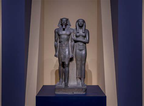 <ol><li><p>Made from Greywacke (strong material)</p></li><li><p>Legs are still attached to stone behind them</p></li><li><p>Wife may either be a goddess or the Queen presenting him to the gods</p></li><li><p>Interesting hierarchy of scale where they are not too different in height</p></li><li><p>2,490 - 2,472 B.C.E.</p></li></ol><p></p>