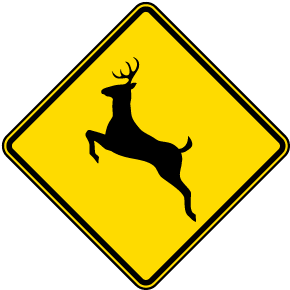Crossing signs warn drivers to watch for animals, humans, and vehicles crossing  the road.