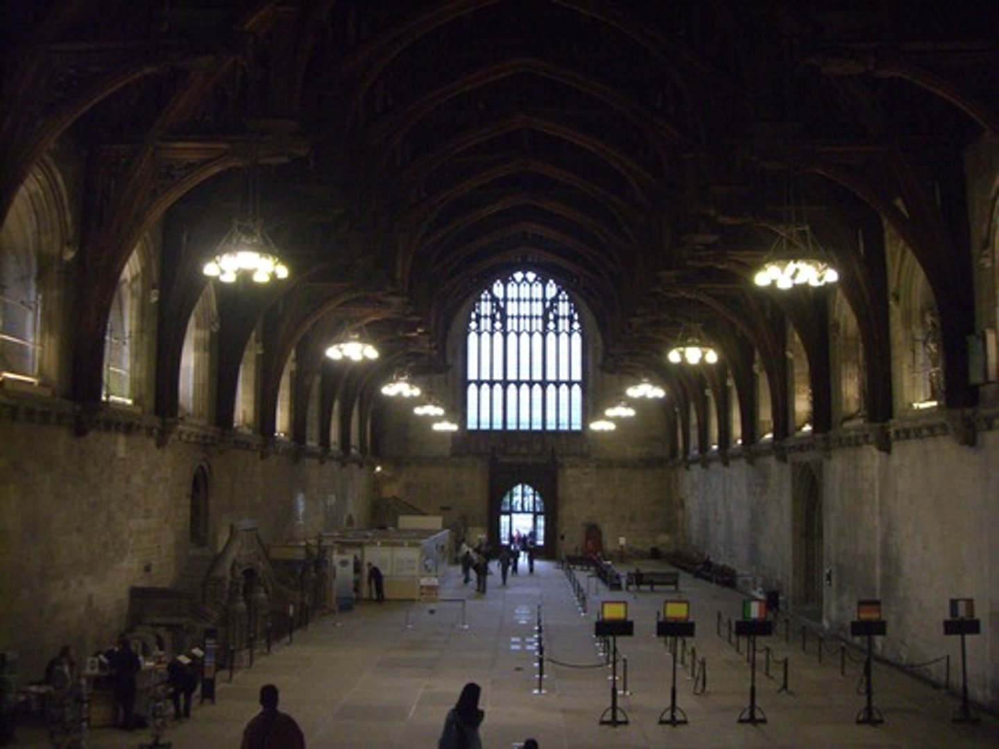 <p>London, England; 1097-1099 (ceiling made in 1390s); wood and stone</p><p>2 Different styles, 3 different time periods</p><p>Lancet windows (Gothic element added in the 20th century as a gift to Queen Elizabeth)</p><p>Built during the Romanesque period (made out of stone)</p><p>Hammerbeam ceiling (built during the gothic period)</p><p>Started under William II as the largest hall in England at the time</p><p>Hall was meant to be used for grand ceremonial occasions, feasts, funerals, and they it was later used as law court</p><p>Bare walls were probably decorated with tapestries</p>