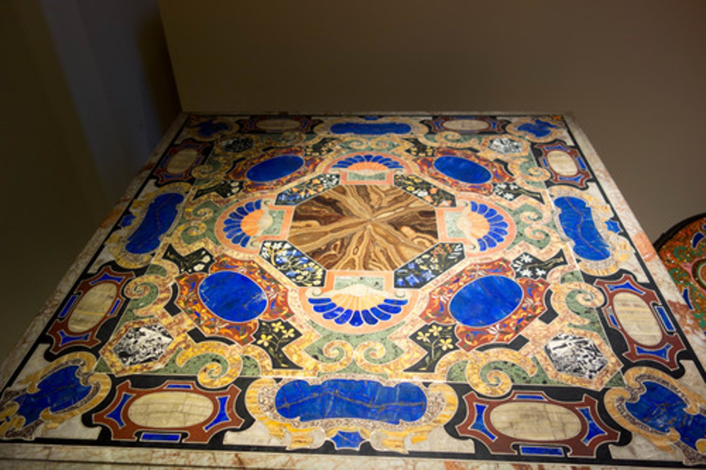 <p>Special Florentine inlay technique of using cut and fitted, highly polished colored stones and marble to create images</p>