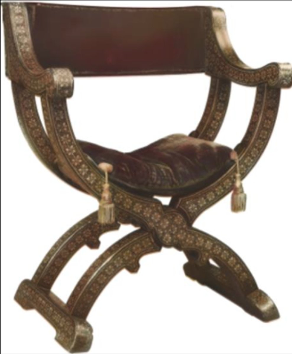 <p>Had 2 front &amp; 2 rear supports of curule or curved. Front &amp; rear supports were secured on each side by runner feet and upper supports by down-curving arms. Seat &amp; back panels were of leather &amp; were stretched between the supports.</p>