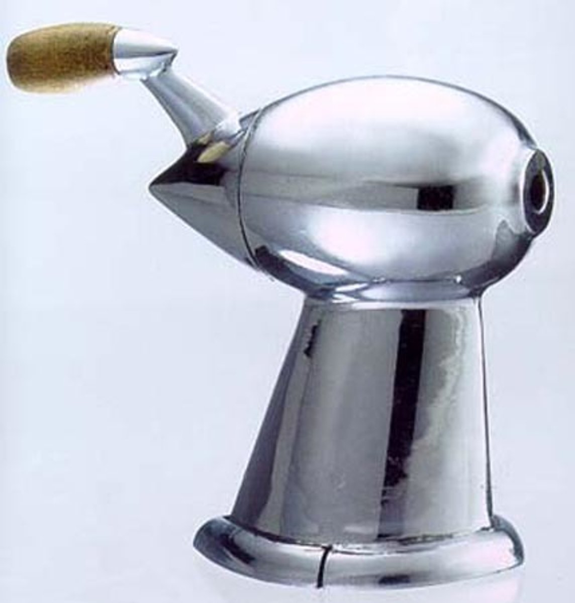 <p>Never went into production - icon of streamlining w teardrop shape<br>Example of ID as form not use<br>screwed into desk but needs to be unscrewed to empty</p>