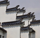 <p>It is an important feature of Huizhou architecture. </p><p>In villages inhabited by ethnic groups, the density of residential buildings is relatively high, which is not conducive to fire prevention. </p><p>The high horse head wall can cut off the source of fire in the event of a fire in neighboring residential buildings. Therefore, the horse head wall is also called the <strong>firewall</strong>.</p><p>The “horse head” of the horse head wall is usually a “<strong>golden seal</strong>” or “<strong>chaohu</strong>”, which shows the master’s pursuit of the ideal of “<strong>reading to be an official</strong>”.</p><p>Looking up from a height, the undulating horse head walls in the villages where the tribes live together give people a visual sense of movement of “<strong>tens of thousands of horses</strong>,” and a metaphor for the vitality and prosperity of the entire clan.</p><p></p>