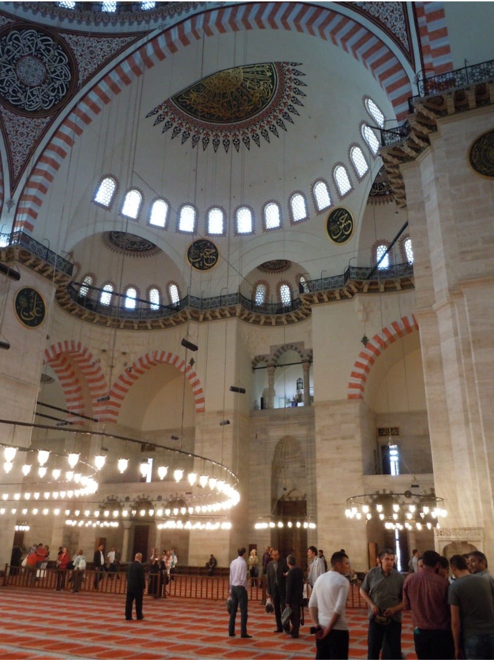 <ul><li><p><span style="font-family: Aptos, sans-serif">Sinan’s “Masterpiece of his Maturity” was the mosque complex that Süleyman built to house his own tomb</span></p></li><li><p><span style="font-family: Aptos, sans-serif">O</span><span>riginal complex: mosque itself, a hospital, primary school, public baths, a Caravanserai, four madrasa, a specialized school for the learning of <em>hadith</em>, a medical college, and a public kitchen that served food to the poor</span></p></li><li><p><span>Plan is Sinan’s closest imitation of Hagia Sophia – he uses only the two axial semi-domes, which form a line leading to the mihrab niche</span></p><ul><li><p><span>If we were to cut off the courtyard, the plan would be almost identical</span></p></li><li><p><span>The resulting profile of the mosque is a perfectly balance concoction of domes, semi-domes, turrets, and buttresses (my 15-scoop ice cream sundae)</span></p></li></ul></li><li><p><span>Almost exactly the same size a Hagia Sophia – the 37-meter dome is only one foot smaller than the dome in the Byzantine church, and the height of the mosque is also nearly the same</span></p></li><li><p><span>Courtyard: Sinan raises the three center arches very slightly to emphasize the main entrance</span></p></li><li><p><span>View of the exterior – noted the aa-b-aaa-b-aa arrangement of the arches – like syncopated music</span></p><ul><li><p><span>Sinan also introduced the “pencil” minaret: tall, thin, with a sharp peaked roof</span></p></li></ul></li><li><p><span>Sinan varies the size of the pointed arches in the gallery, with an a-b-a plan, instead of using a row of identical arches (like the Hagia Sophia); other than that, the effect is nearly identical</span></p><ul><li><p><span>The end result is an interior that is more classically balanced than Şehzade Camii</span></p></li></ul></li><li><p><span>Bulk of ornamentation is situated around mihrab, where Sinan has allowed the use of Iznik ceramics</span></p><ul><li><p><span>Stained glass windows are placed on either side of the mihrab – but all the other windows in the mosque are of plain white glass to allow the max. amount of light into the space</span></p></li></ul></li><li><p><span>Uses spolia from ruined Byzantine churches</span></p><ul><li><p><span>This was ordered by Süleyman himself, who saw the Ottoman sultans as the legitimate successors to the Byzantine emperors</span></p><ul><li><p><span>The closeness of the plan to that of Hagia Sophia is also directly related to this imperial self-promotion</span></p></li></ul></li><li><p><span>Although older columns were used as spolia, Sinan did not allow any antique column capitals to be used in his mosques</span></p><ul><li><p><span>Instead, he devises a blend of Turkish triangles and muqarnas to decorate the tops of the Byzantine spolia</span></p></li></ul></li></ul></li></ul><p></p>