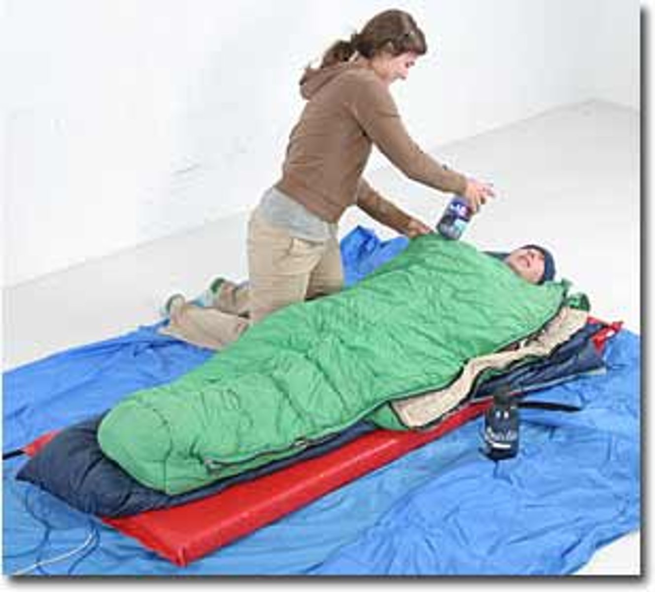 <p>remove any wet clothing and wrap the person in blankets, towels, or newspapers; offer warm food or drink; do not use hot drinks, water or electric blankets</p>