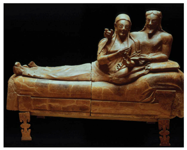 Etruscan 
c. 520 B.C.E. 
Terra cotta

Emergence of master sculptors and painters. High class women could socialize with men, unlike the Greeks where they were separate.

Elongated limbs common to archaic period. Top part is an urn for ashes. Had to be fired in multiple pieces.