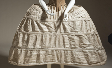 <p>meaning basket, a hoopskirt that creates a wide silhouette</p>