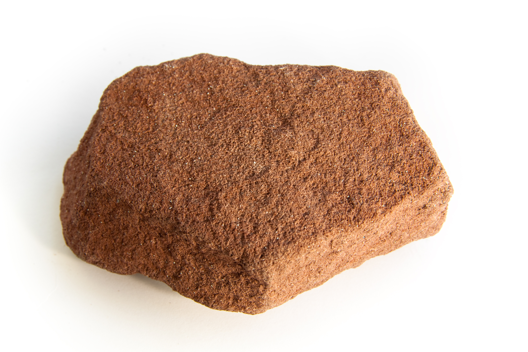 <p>Sedimentary rock: <span style="font-family: Google Sans, Roboto, arial, sans-serif">Sandstone</span></p><p><span style="font-family: Arial, Helvetica">Sandstones are made of sand grains that have been cemented together. Like sandpaper, sandstones usually have a rough, granular texture, but to really identify a sandstone you have to peer closely at its surface and look for individual sand grains. Since the grain diameters range from 2 mm all the way down to only 0.06 mm, you may need a good magnifying lense to see the sand grains in a fine-grained sandstone.</span><span style="font-family: Google Sans, Roboto, arial, sans-serif"> </span></p>