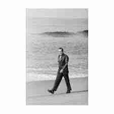 <p>Richard Nixon walking in the rain(rain)</p>