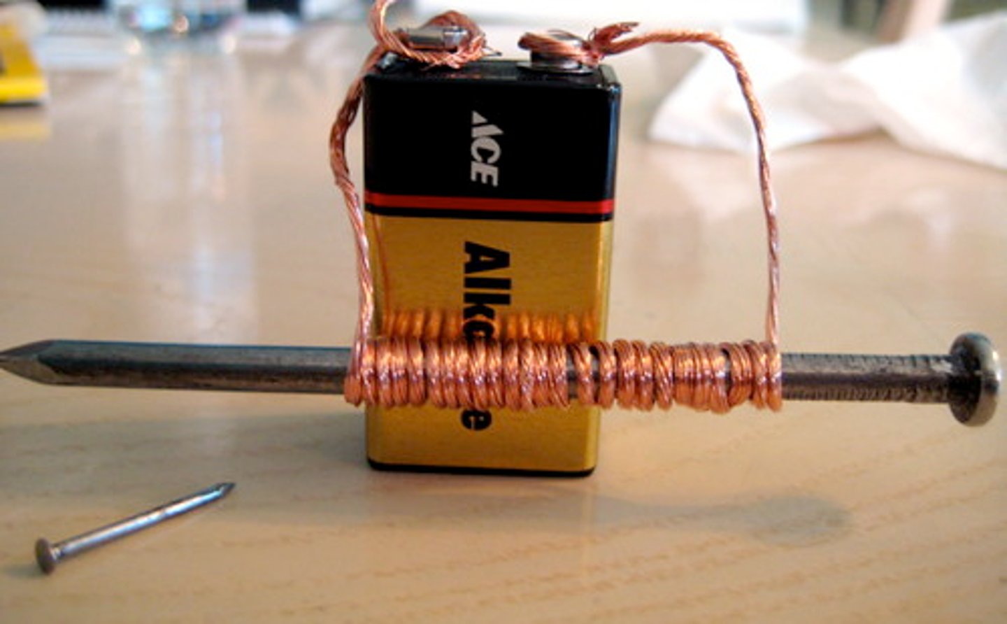 <p>magnet when an electric current moves through it</p>