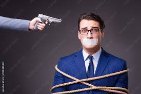 <p>someone who is taken as a prisoner by an enemy in order to force the other people involved to do what the enemy wants<br>Ex: <em>She was taken </em><strong><em><u>hostage </u></em></strong><em>by the gunmen.</em></p>