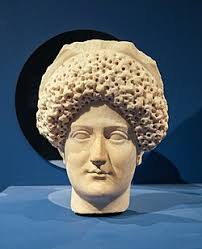 <p>Domitia Longina had a very fanciful, large hairstyle</p>