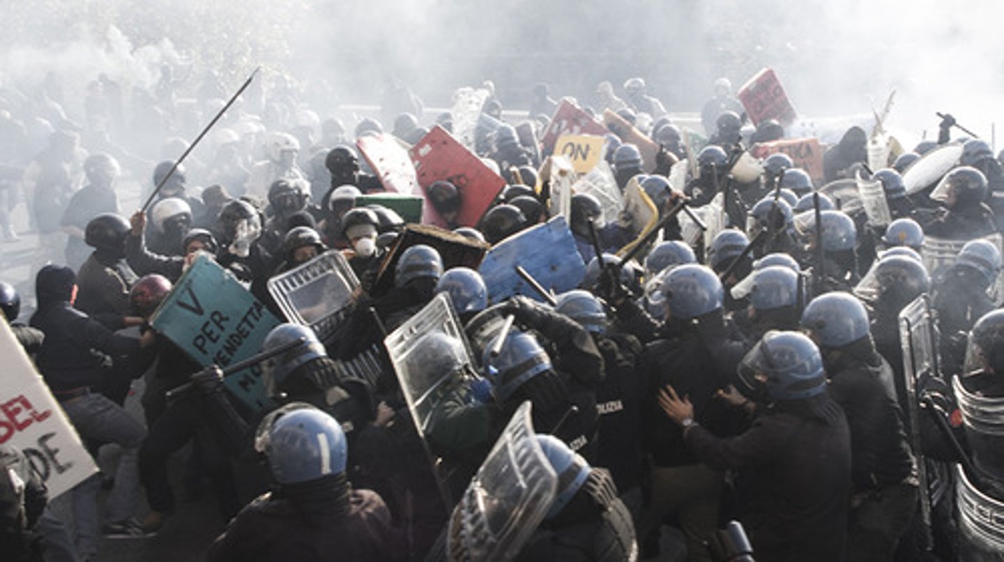 <p>(n) 1. Public disorder or violence. 2. A great and seemingly disordered quantity of something. (v) To take part in a disorder.</p>