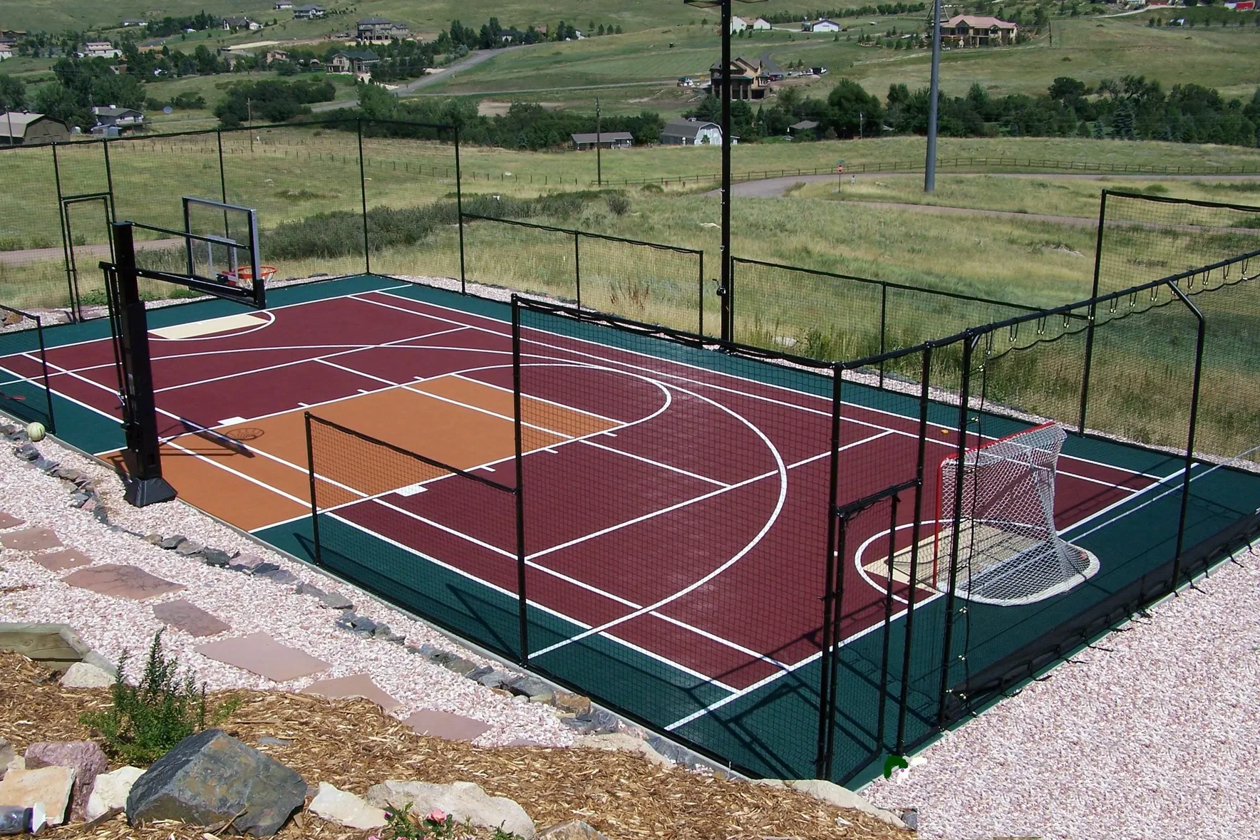 <p><span>A flat area with lines for games like tennis, basketball, squash</span></p>