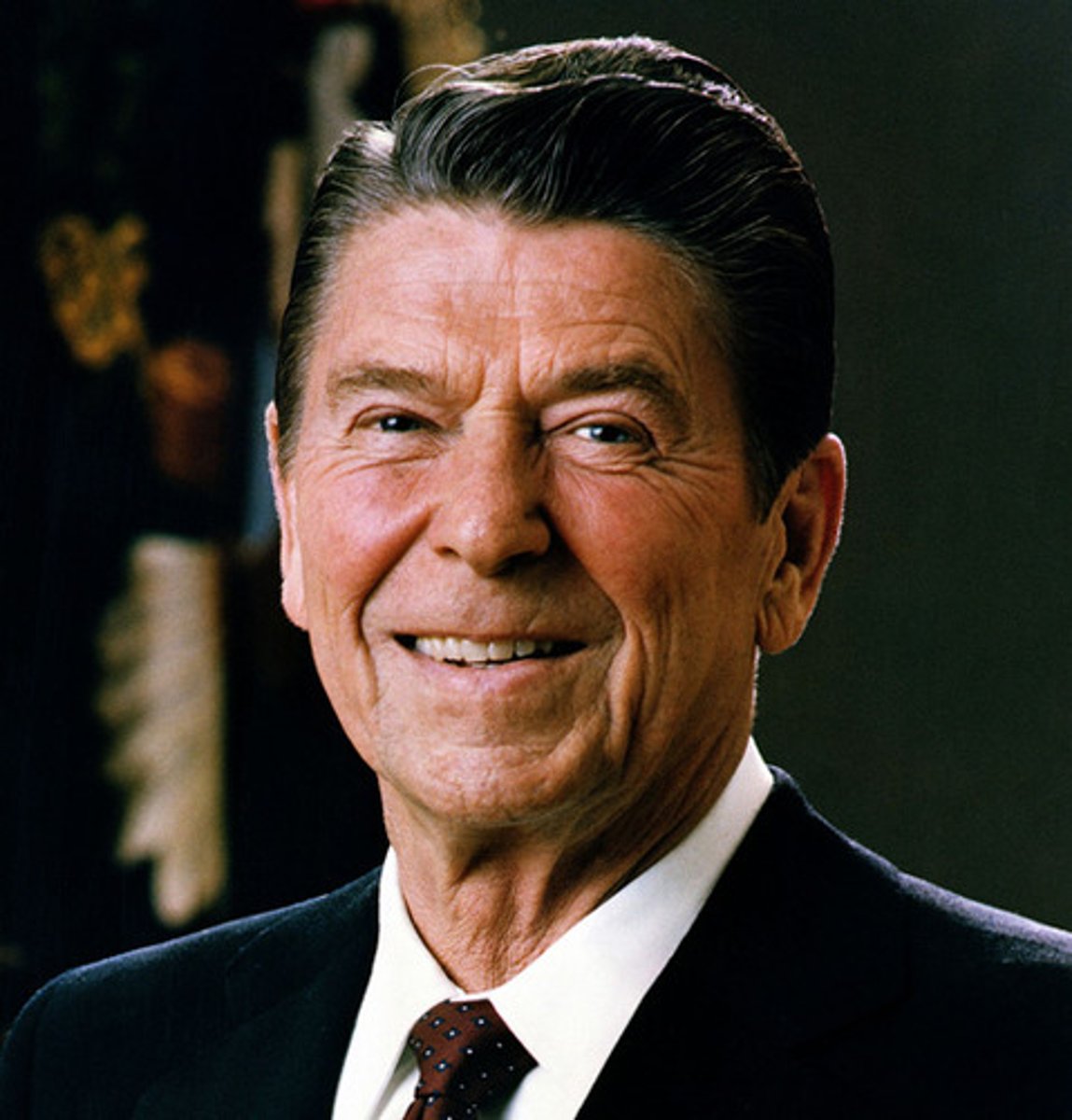 <p>"Reagan Revolution": reduce reliance on government; Reaganomics: supply-side, laissez-faire, send troops to Grenada, escalated the Cold War: "rollback" of communism, Strategic Defense Initiative (Star Wars); War on Drugs, Iran-Contra affair, second term-ended cold war ("tear down this wall" (Berlin Wall)</p>