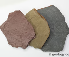 <p>sedimentary, fine-grained texture. thinly laminated, typically gray color, smooth surface, softer/lighter than slate. makes a low-pitched, dull sound when tapped on a surface.</p>