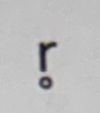 <p>r with dot underneath (vowel) </p>