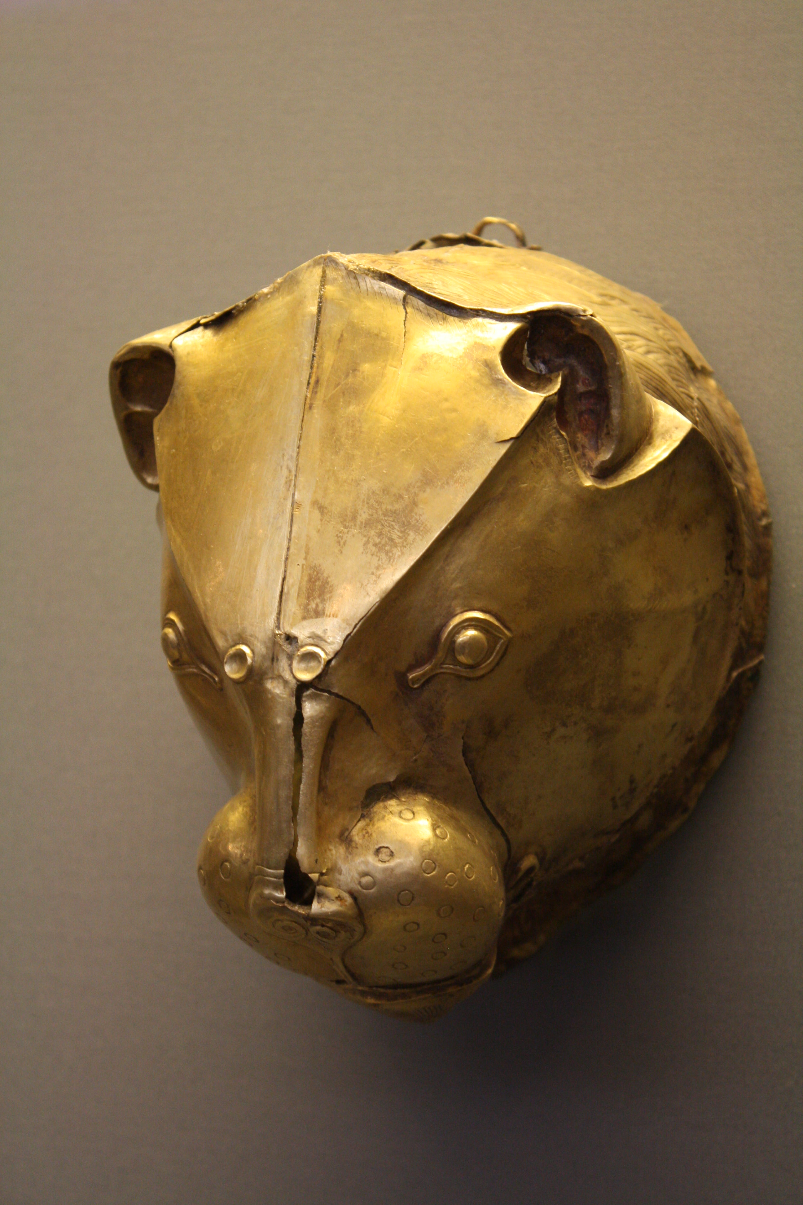 <p><strong><u>Size</u></strong> : </p><ul><li><p>differs depending on the shape of the Rhyton ( i.e normal vessel/ animal head/ other figure</p></li><li><p>roughly cone shaped </p></li></ul><p></p><p><strong><u>Materials</u></strong> :</p><p><strong>pottery</strong> or <strong>metal</strong></p><p></p><p><strong><u>Use :</u></strong></p><ul><li><p>containing and pouring liquid ( wine )</p></li><li><p>most likely used at banquets, feasts</p></li><li><p>liquid designed to fall from the bottom or the mouth of animal head. </p></li></ul><p></p>